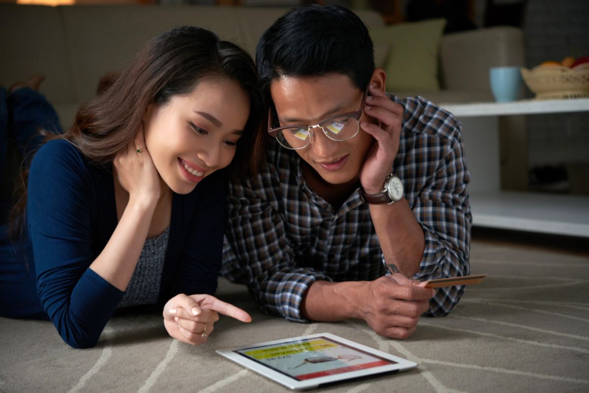 A young couple taking look at the month's budget