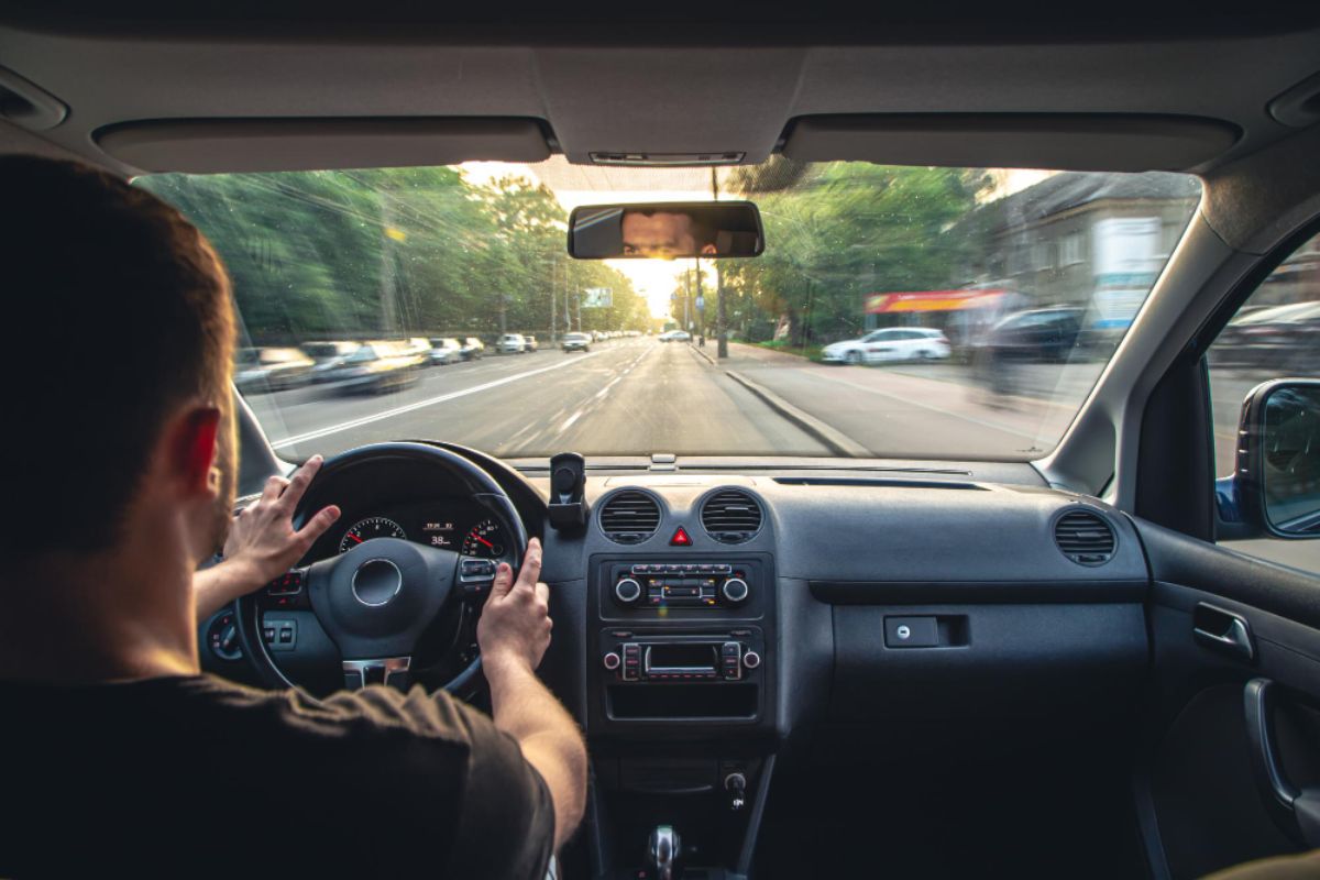 A driver cruising down the thoroughfare