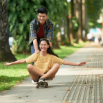 People enjoying an afternoon outdoors in a green, walkable community, reflecting the lifestyle at Pueblo de Oro Courtyards Lipa.