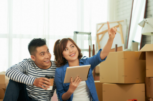 Homebuyers planning their property investment while choosing between city living and suburban living.
