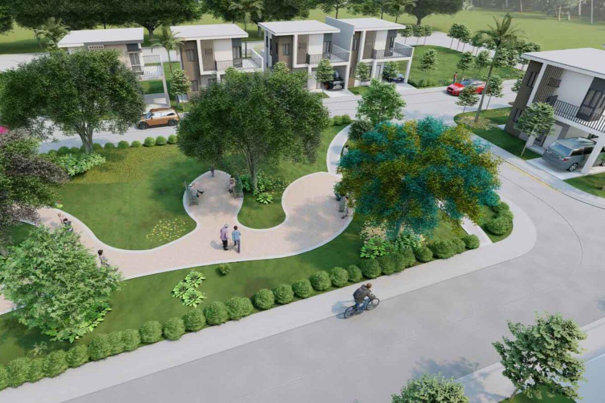 Community park and green open spaces within a modern residential subdivision in Batangas.