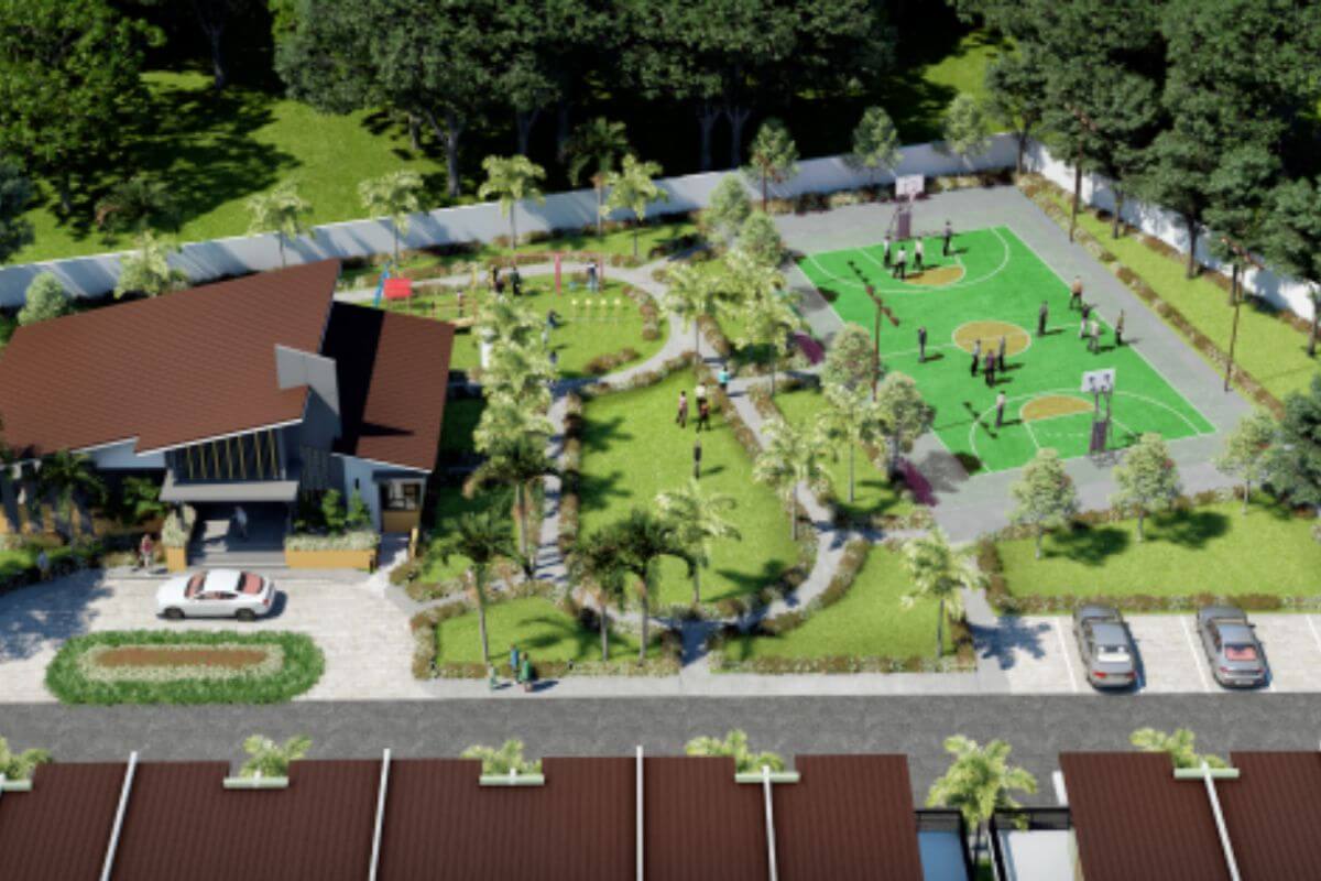 Community clubhouse, landscaped park, and basketball court within a family-friendly residential development in Cebu.